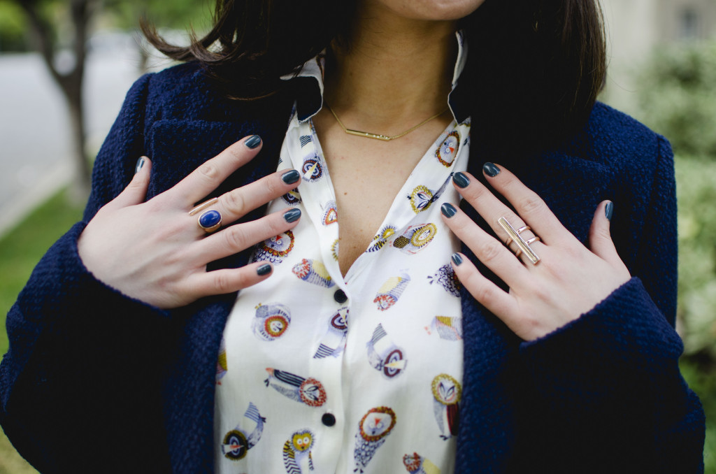 Blogger Nihan Gorkem showing her Zara owly shirt, Topshop rings, madewell petite necklace and green manicure 
