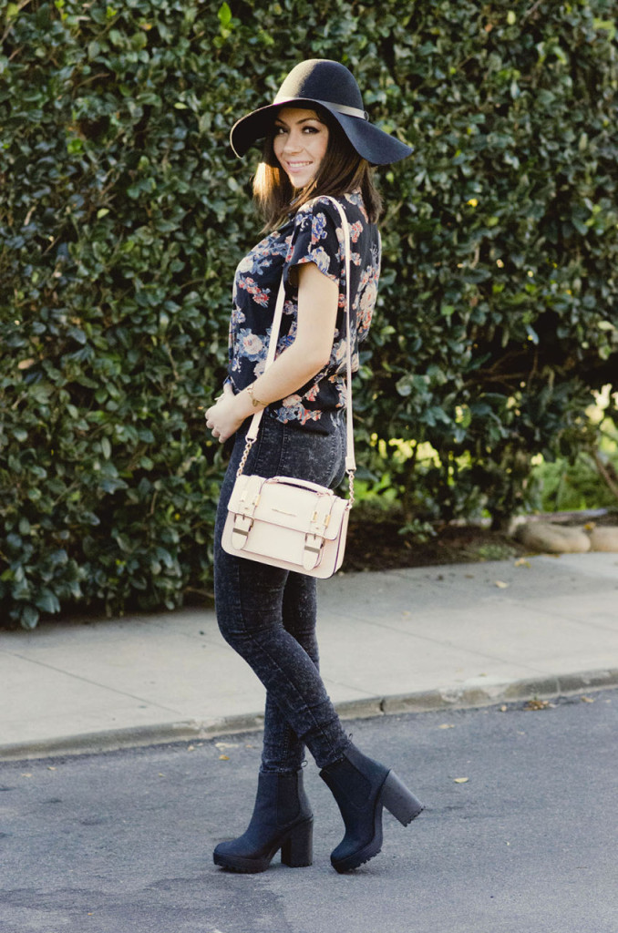 Nihan wearing ASOS floral shirt, H&M floppy hat, jeans, boots and River Island structured bag