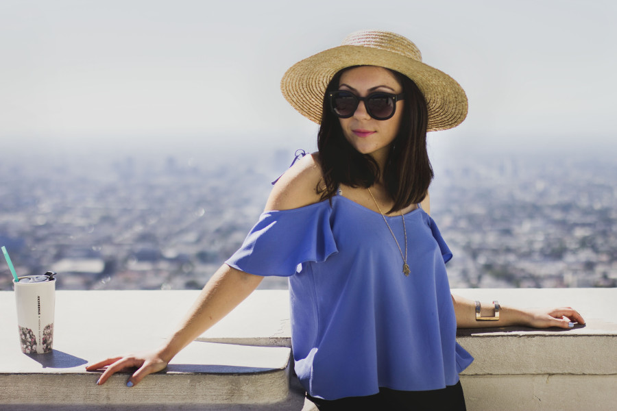 Nihan wearing blue Topshop tie strap top, Brandy melville shorts and Lack of Color Spencer Fedora at Griffith Observatory in Los Angeles
