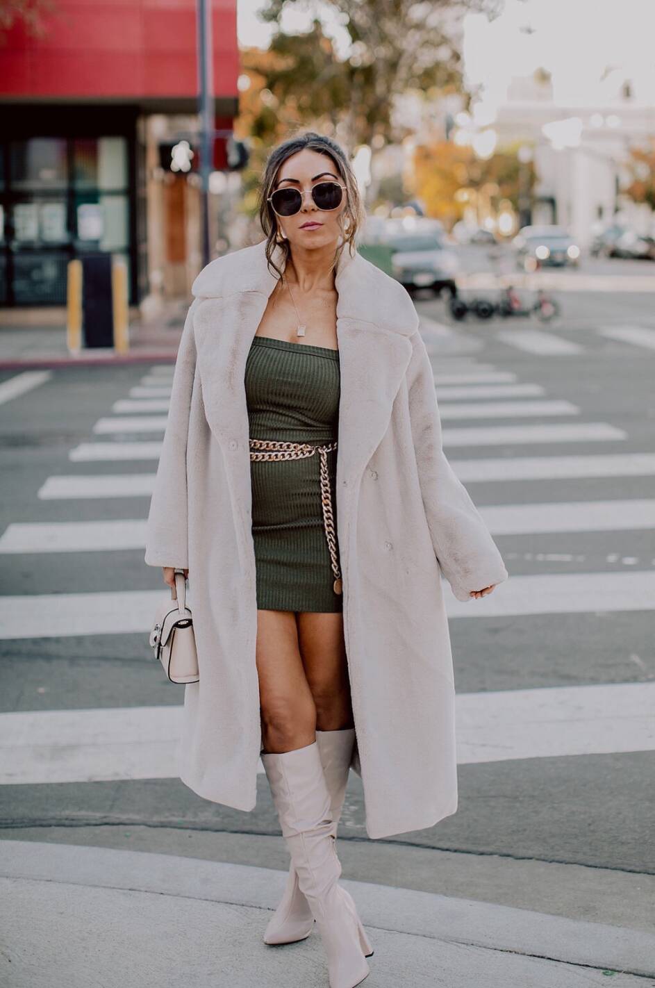 Style with Nihan wearing Privacy Please mini knit dress, HM faux fur coat and Public Desire knee high boots Downtown San Diego
